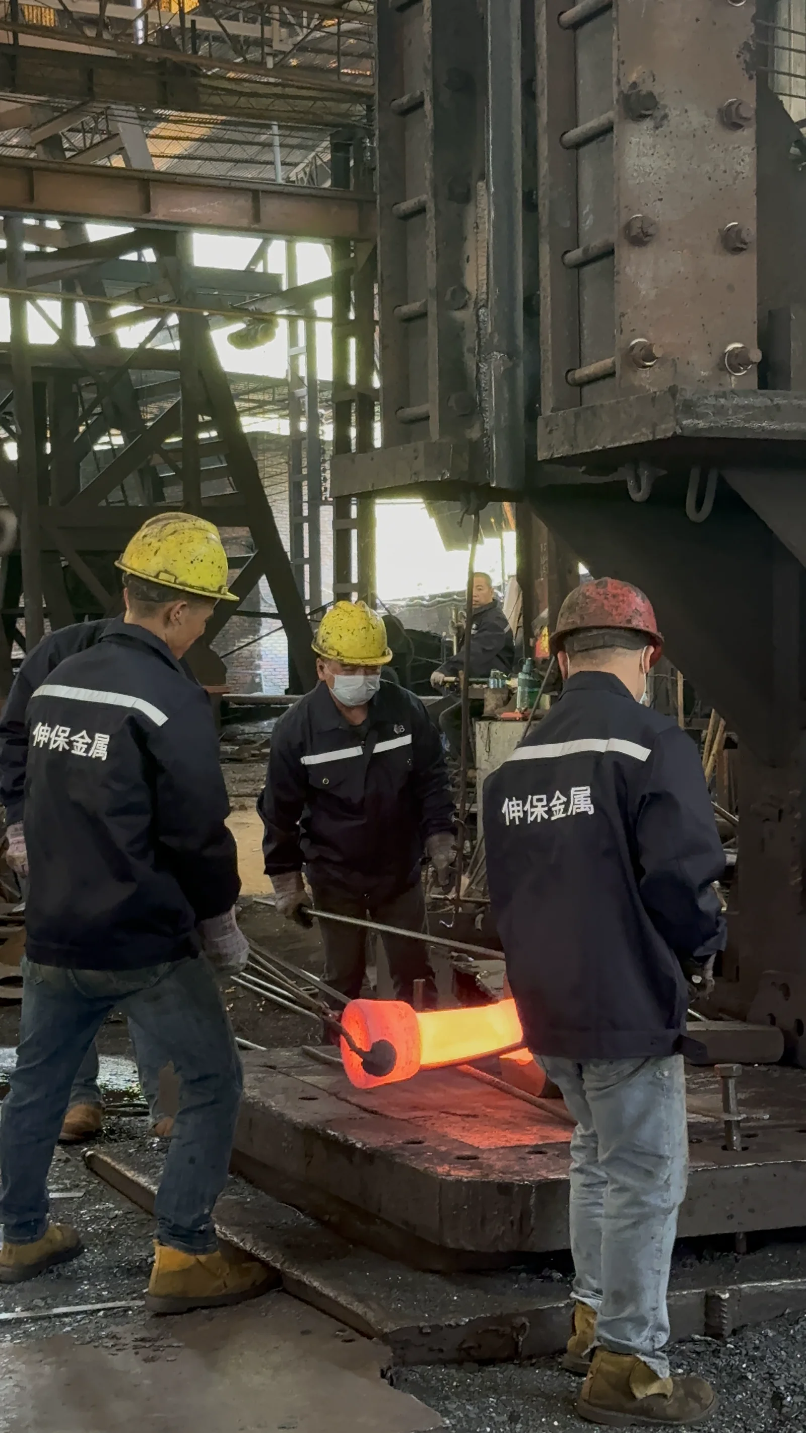 Sunbond forging team wearing company workwear during production